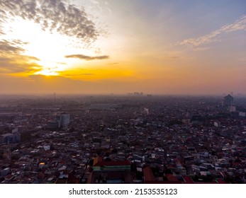 Aerial View Of Epic Sunrise And Dense City Of Jakarta