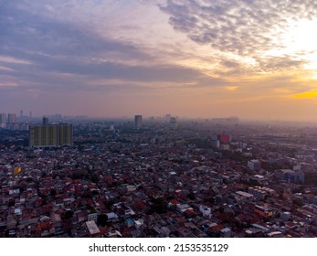 Aerial View Of Epic Sunrise And Dense City Of Jakarta