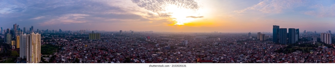 Aerial View Of Epic Sunrise And Dense City Of Jakarta