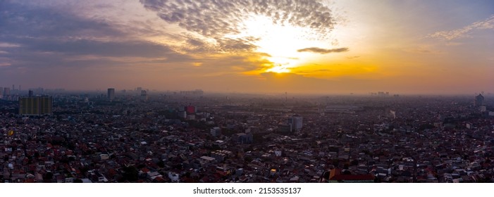 Aerial View Of Epic Sunrise And Dense City Of Jakarta