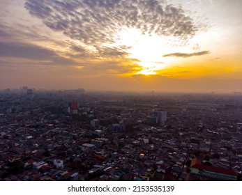 Aerial View Of Epic Sunrise And Dense City Of Jakarta