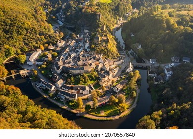 Aerial view of Esch-sur-Sure medieval town in Luxembourg famous for its ancient Castle. Forests of Upper-Sure Nature Park, meander of winding river Sauer, near Upper Sauer Lake. Canton Wiltz. - Shutterstock ID 2070557840