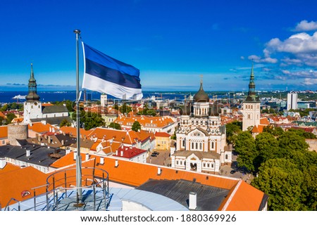 An aerial view of the Estonian flag waving on the Tall Hermann Tower ,Tallinn, Estonia