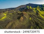 Aerial view of Etna Volcano crater  near Catania, Italy, Sicily.. Silvestri lava volcanic crater at the slopes of Mount Etna