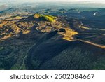 Aerial view of Etna Volcano crater  near Catania, Italy, Sicily.. Silvestri lava volcanic crater at the slopes of Mount Etna