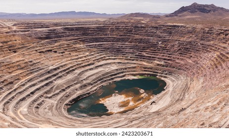 Aerial view of an exhausted open pit copper mine near Ajo, Arizona, USA. - Powered by Shutterstock