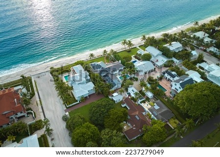 Aerial view of expensive residential houses in island small town Boca Grande on Gasparilla Island in southwest Florida. American dream homes as example of real estate development in US suburbs