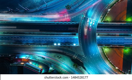 Aerial view Expressway motorway highway circus intersection at Night time Top view , Road traffic in city at thailand.