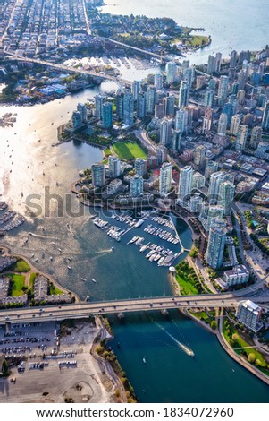 Aerial view of False Creek in Downtown Vancouver, British Columbia, Canada. Modern City viewed from above. Bright Sunny Day