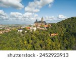 Aerial view of famous Castle Wernigerode, in beautiful golden evening light, Saxony-Anhalt, Germany