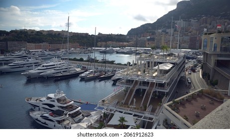 Aerial View Of The Famous City On The Mediterranean Sea Luxury Yacht Moored In The Bay, Marina Port, Yacht Club. Panorama Of The European Landscape From Above MONTE CARLO, MONACO SEPTEMBER 2021 