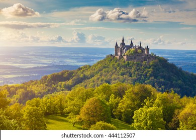 Aerial view of famous Hohenzollern Castle, ancestral seat of the imperial House of Hohenzollern and one of Europe's most visited castles, in beautiful golden evening light, Baden-Wurttemberg, Germany - Shutterstock ID 444112507