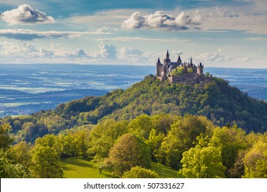 Aerial view of famous Hohenzollern Castle, ancestral seat of the imperial House of Hohenzollern and one of Europe's most visited castles, in beautiful golden evening light, Baden-Wurttemberg, Germany