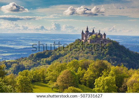 Aerial view of famous Hohenzollern Castle, ancestral seat of the imperial House of Hohenzollern and one of Europe's most visited castles, in beautiful golden evening light, Baden-Wurttemberg, Germany