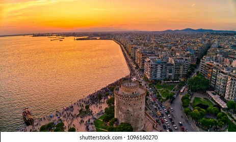Aerial view of famous White Tower of Thessaloniki at sunset, Greece. Image taken with action drone camera. HDR image