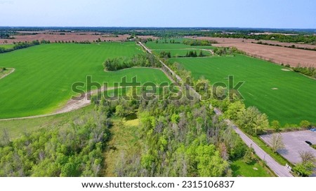 Aerial view of farmland in the Duffins Rouge Agricultural Preserve, Durham County, Ontario, Canada. Spring 2023