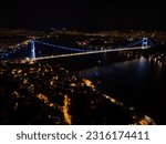 Aerial view of Fatih Mehmet Bridge with blue light in the evening (Fatih Sultan Mehmet Köprüsü) and Bosphorus View