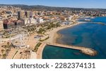 Aerial view of the Ferris wheel located on the waterfront of Civitavecchia in the Metropolitan City of Rome, Italy. On the city