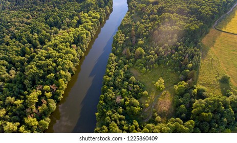 Aerial view of fields, forest, river, a beautiful landscape of nature.