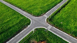  Aerial View Of A Flat Automobile Intersection. Static Video. A Flat Road With Markings. View From The Height Of The Highway