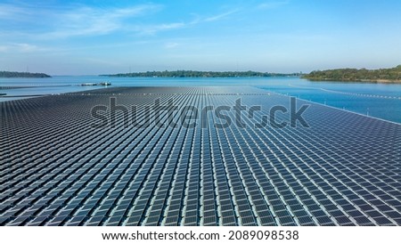 Aerial view floating solar cell power plant with solar cell generate the electric on the lake, Floating solar panels and cell platform on the water ecological energy, Alternative renewable energy.