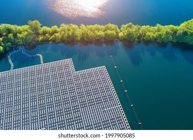 Aerial view of Floating solar panels cell platform system park farm on the lake