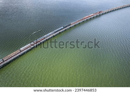 Aerial view of the floating train in Pasak Chonlasit Dam, Lopburi, Thailand