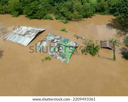 Aerial view of a flood in Southeast asian due to heavy rains and La Nina phenomenon.