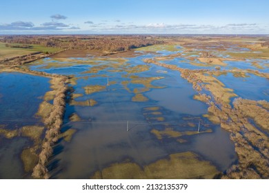 Aerial view of flooded fields and meadows