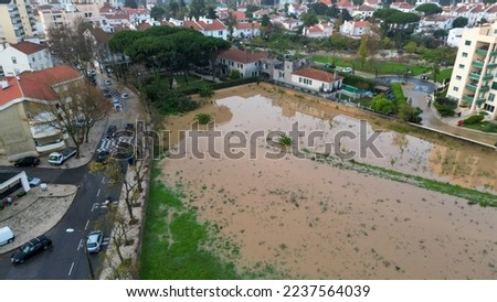 Aerial view from a floods, due to the river overflowing flooding houses and roads at Estoril,Cascais,Portugal