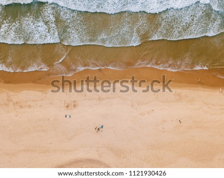 Similar – Aerial View From Flying Drone Of People Crowd Relaxing On Algarve Beach In Portugal