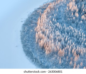 Aerial view of forest river in time of winter day. Stock Photo