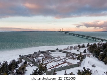 Aerial view of Fort Michilimackinac Park and Mackinac Bridge in the background - Shutterstock ID 2243326085