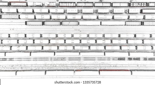 Aerial View Of Freight Train Yard Covered In Snow