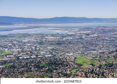 Aerial View Of Fremont And Newark On The Shoreline Of East San Francisco Bay Area; Dumbarton Bridge In The Background; Silicon Valley, California