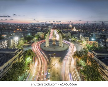 Aerial View Front Democracy Monument Light Running Car At Sun Rise, Bangkok, Thailand.