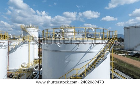 Aerial view fuel storage tank oil, Large white industrial for tank oil., Crude oil export factory industry storage tank industrial pipes, Business petrochemical industrial.