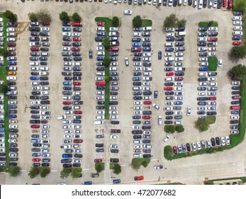 Aerial View Full Cars At Large Outdoor Parking Lots In Houston, Texas, USA. Outlet Mall Parking Congestion And Crowded Parking Lot With Other Cars Try Getting In And Out, Finding Parking Space.