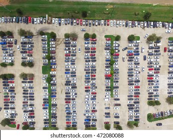 Aerial View Full Cars At Large Outdoor Parking Lots In Houston, Texas, USA. Outlet Mall Parking Congestion And Crowded Parking Lot With Other Cars Try Getting In And Out, Finding Parking Space.