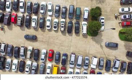 Aerial View Full Cars At Large Outdoor Parking Lots In Houston, Texas, USA. Outlet Mall Parking Congestion And Crowded Parking Lot, Other Cars Try Getting In And Out, Finding Parking Space. Panorama