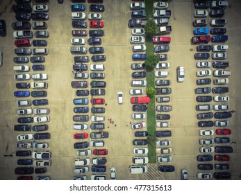 Aerial View Full Cars At Large Outdoor Parking Lots In Houston, Texas, USA. Outlet Mall Parking Congestion And Crowded Parking Lot, Other Cars Try In And Out, Finding Parking Space. Vintage Filter