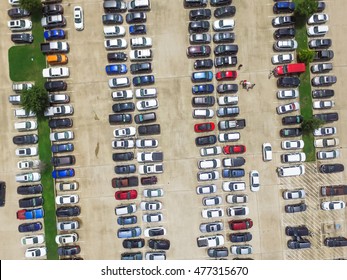 Aerial View Full Cars At Large Outdoor Parking Lots In Houston, Texas, USA. Outlet Mall Parking Congestion And Crowded Parking Lot With Other Cars Try Getting In And Out, Finding Parking Space.