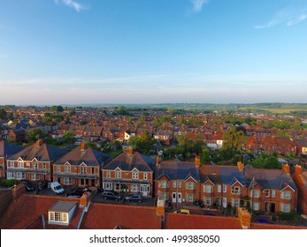 Aerial View Of Garden And Roof Tops Of British Housing Development