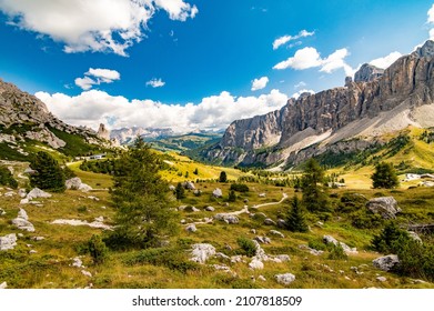Aerial view of Gardena Pass, Sass da Ciampac, Tor Bornech and Sass dla Luesa, Trentino Alto Adige, Italy. Alpine meadows and Passo Gardena.