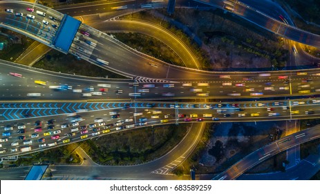 Aerial view gate for expressway fee payment in the city at night.