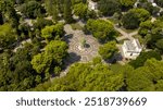 Aerial view of the gazebo in Giuseppe Garibaldi public gardens in Lecce, Puglia, Italy. It is a green area with trees and flowerbeds in the historic center of the apulian city.