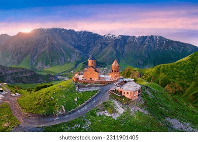 Aerial view of Gergeti trinity church at sunrise in Georgia. - Powered by Shutterstock