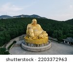 Aerial View of Giant Golden Maitreya Buddha Statue, Thousand Buddha Mountain, Jinan, China