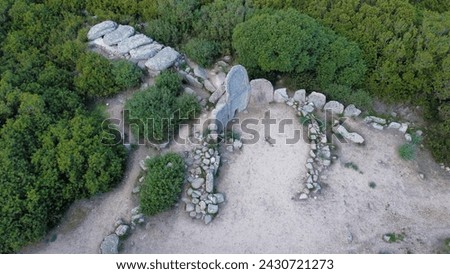 aerial view Giants' grave of Coddu Vecchiu built during the bronze age by the nuragic civilization, Doragli, Sardinia, Italy
