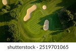 Aerial View of Golf Course Green and Bunkers, howcasing a well-maintained green surrounded by sandy bunkers.